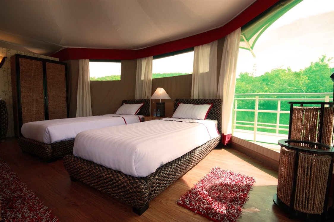 Bedroom Interior at 4 Rivers Floating Lodge, Cambodia