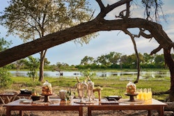 Alfresco Dining at Khwai River Lodge, A Belmond Safari, Botswana