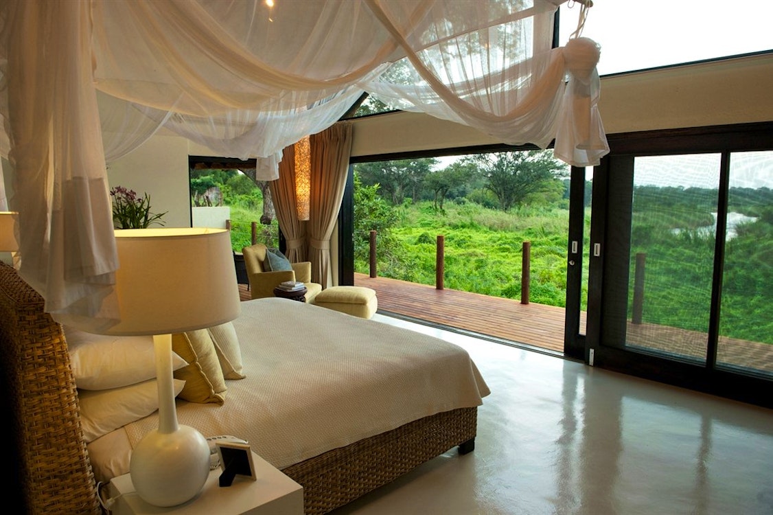 Luxury Suite Bedroom at Lion Sands River Lodge, South Africa