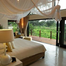 Luxury Suite Bedroom at Lion Sands River Lodge, South Africa