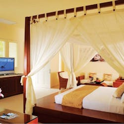 Princess Villa bedroom at Princess d'Annam Resort & Spa