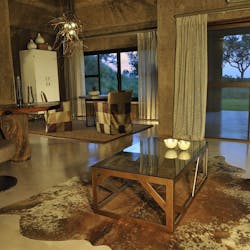 Bedroom lounge area at Sabi Sabi Earth Lodge, South Africa