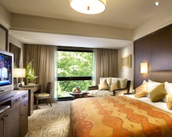 Guest bedroom at Shangri-La Rasa Sayang Resort and Spa