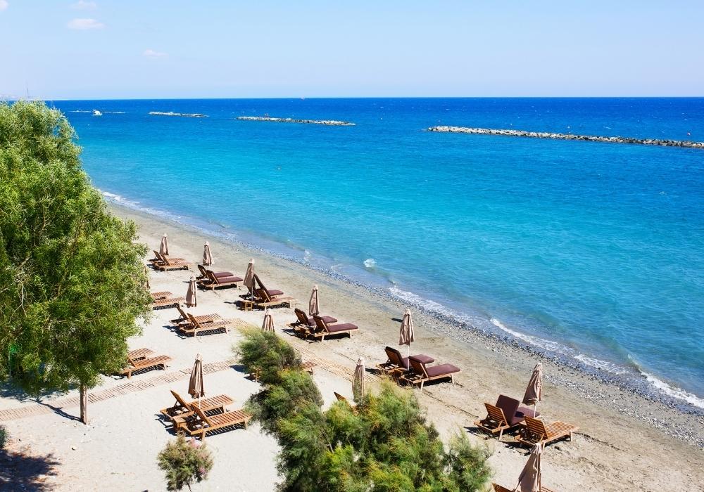 Limassol beach with sun loungers