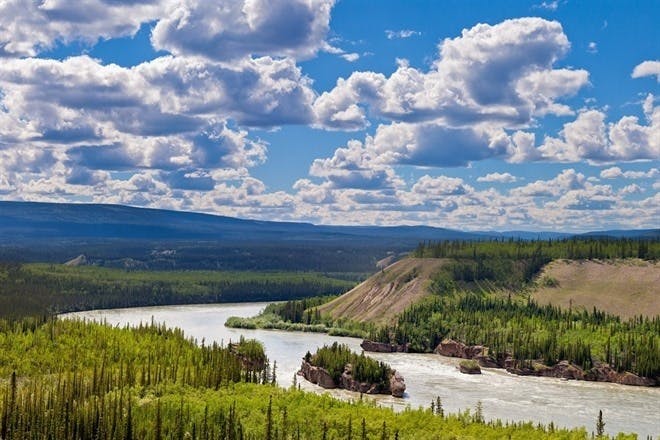 Dawson City to Whitehorse (333 miles) to UK